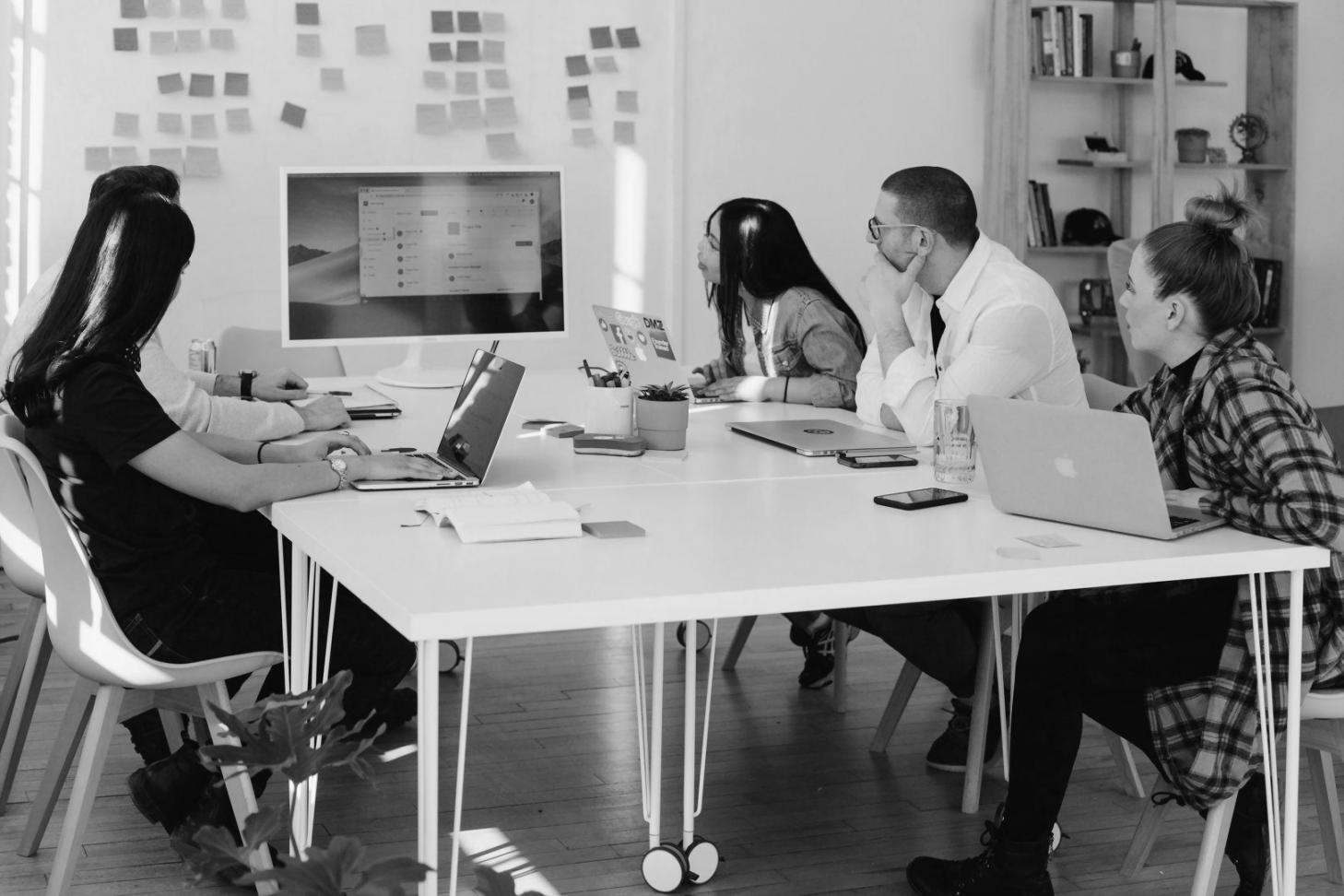 Early team meeting discussing financial planning concepts